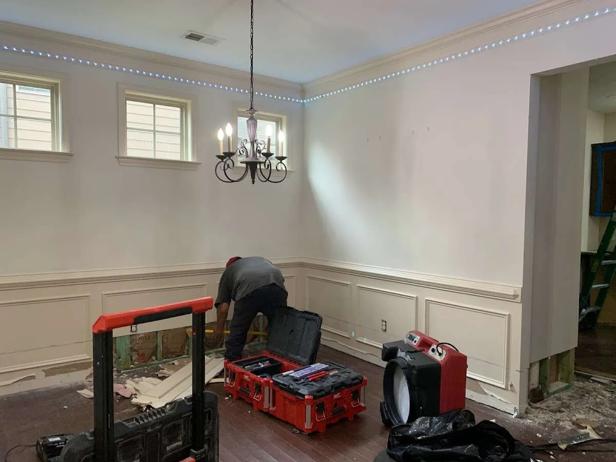 Restoration technician with professional equipment in Charlestown
